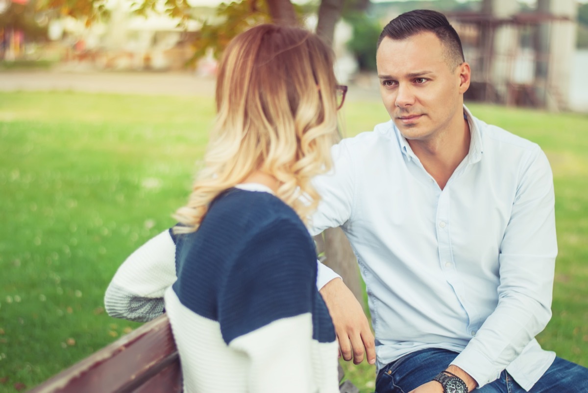 man and woman serious conversation