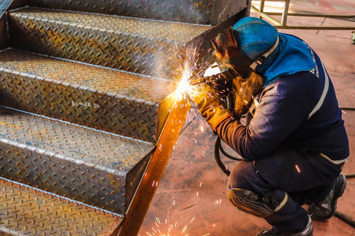 iron worker welding staircase