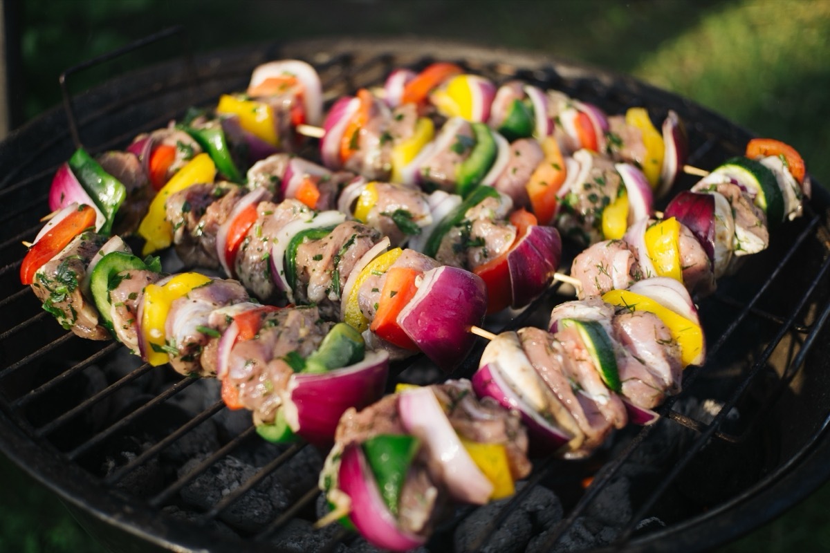 Cooking kebabs on a grill