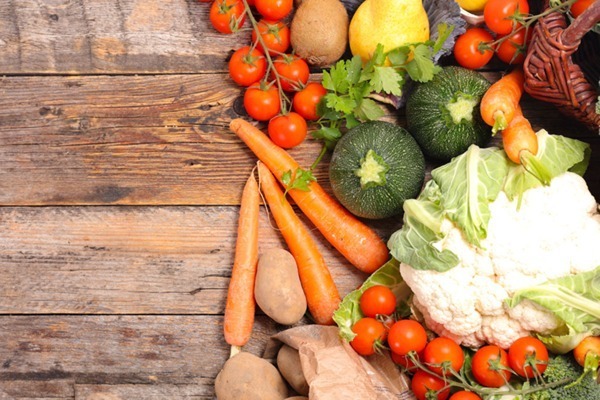 Raw vegetables on cutting board