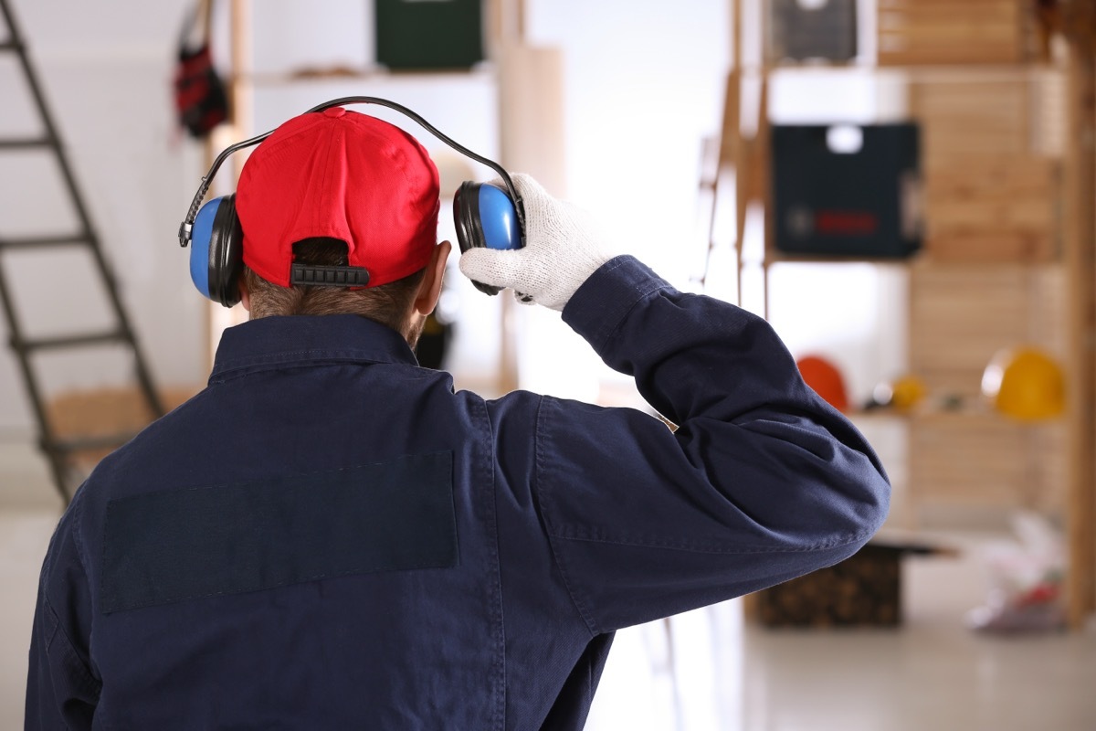 man wearing safety headphones