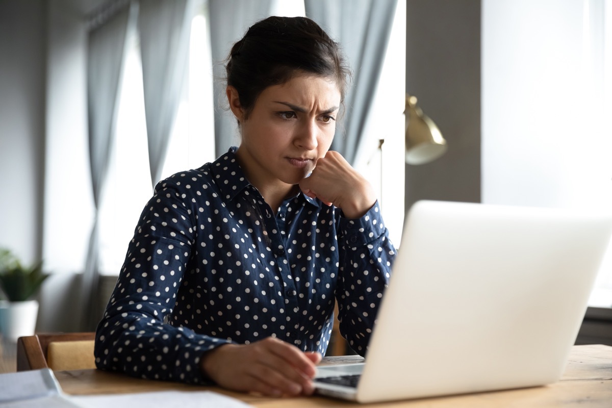 student professional use look at laptop at home office feel stressed frustrated about computer software problem worried of technology negative online news concept