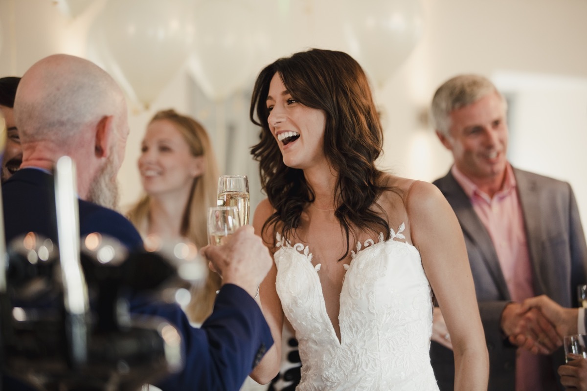 wedding couple greeting guest separately