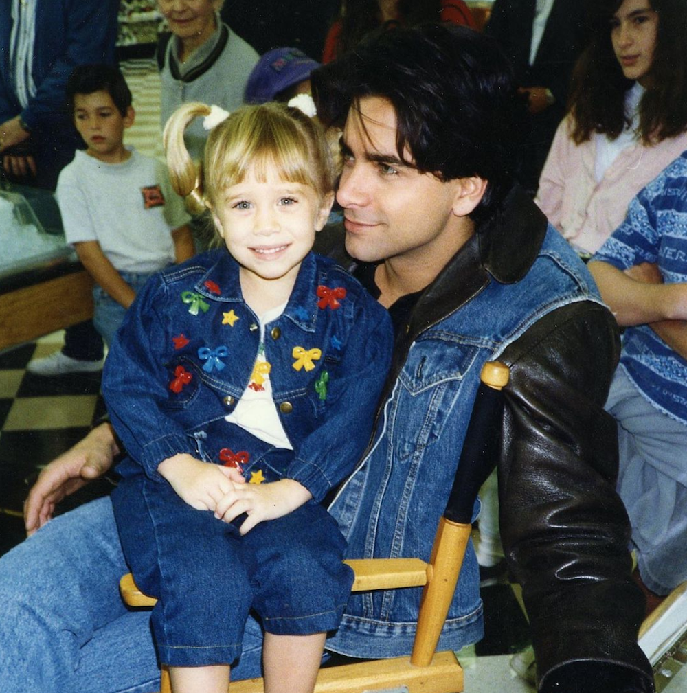 John Stamos with an Olsen twin.