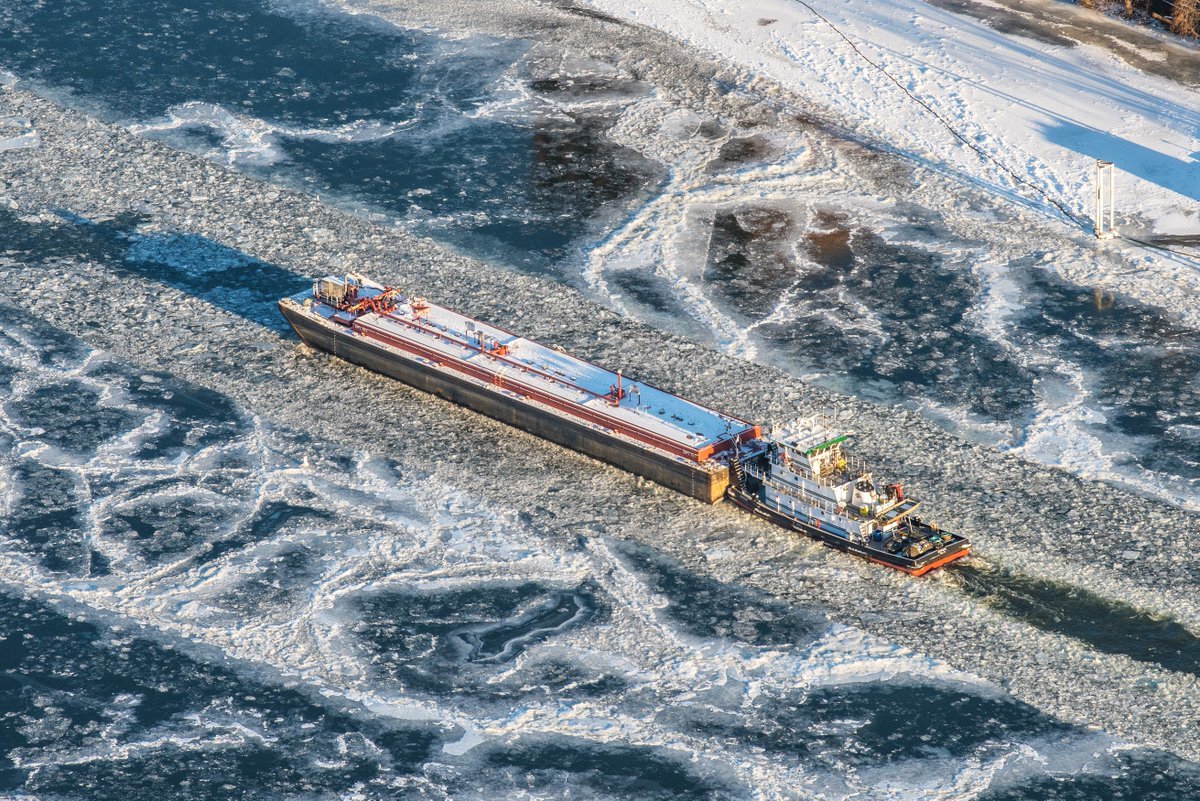 barge moving through frozen allegheny