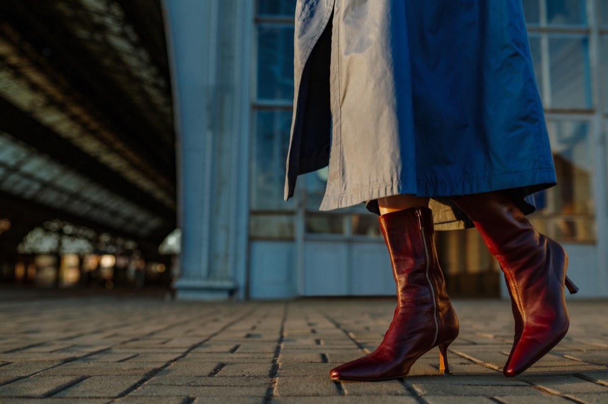 woman wearing kitten heel boots