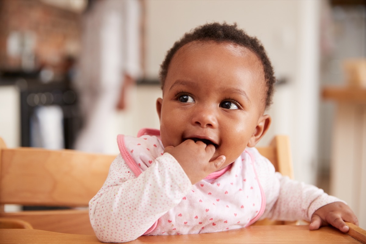 black baby girl in pink outfit