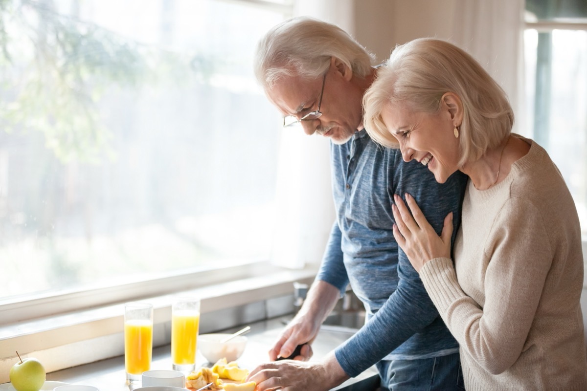 couple in the kitchen cooking together