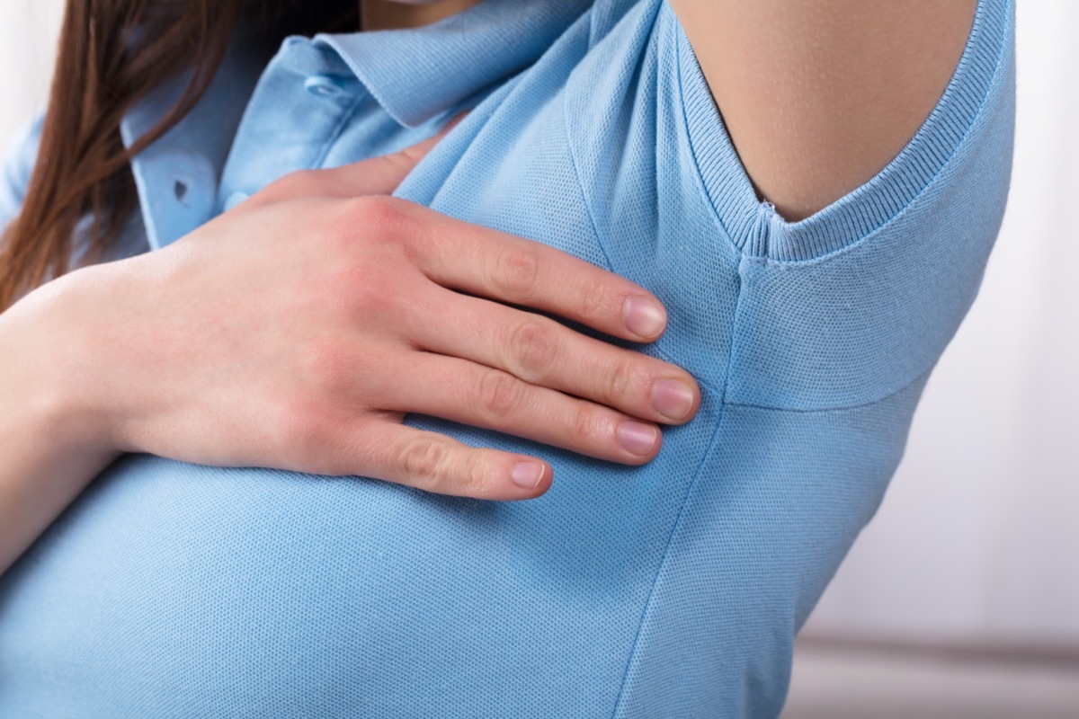 Close-up Of A Woman With Hyperhidrosis Sweating Very Badly Under Armpit