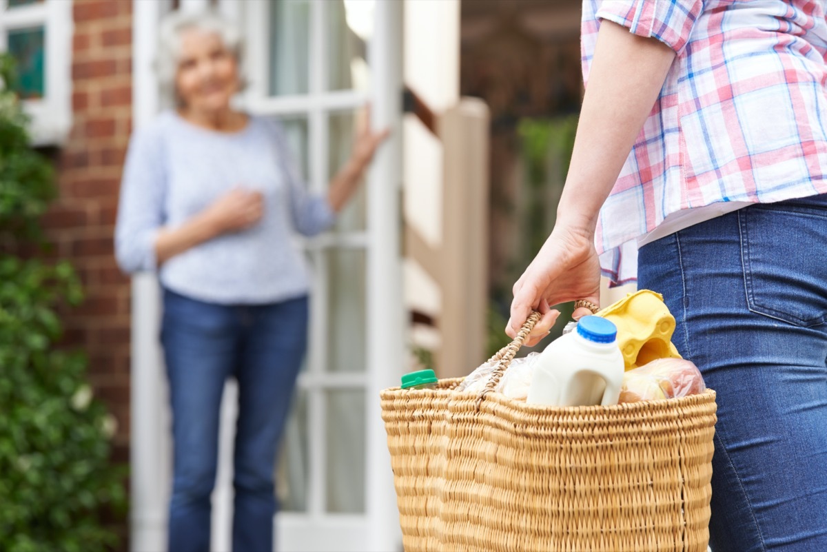 Person Doing Shopping For Elderly Neighbor