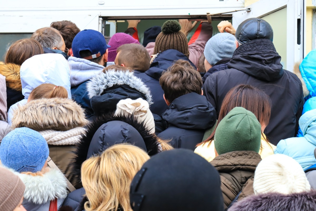 people lining up to get into store