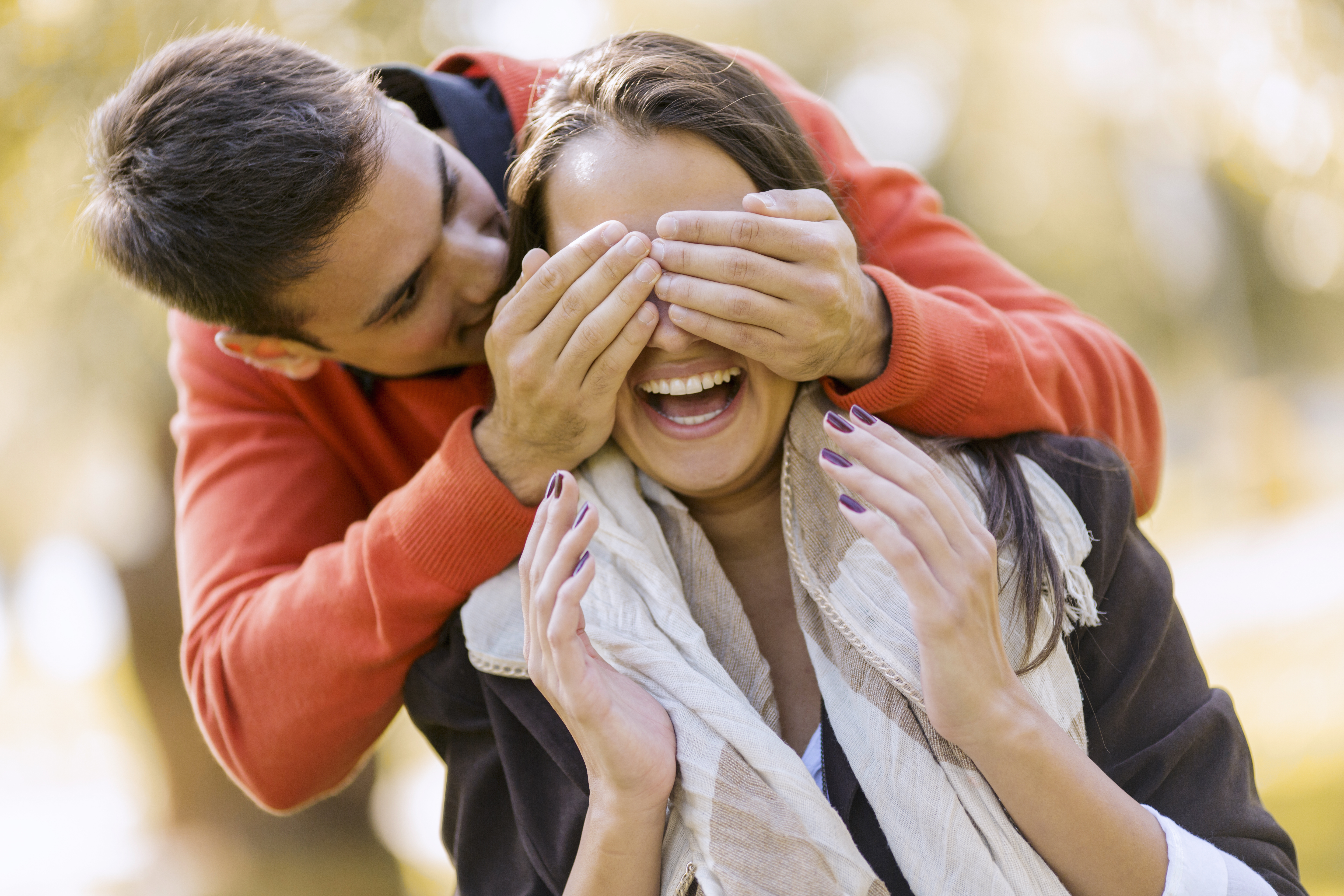 man and woman smiling