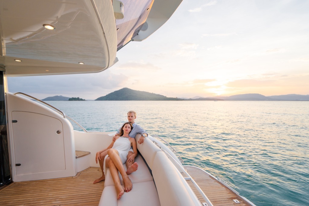 Couple on a boat ride, a great non-cliché second date. second date ideas