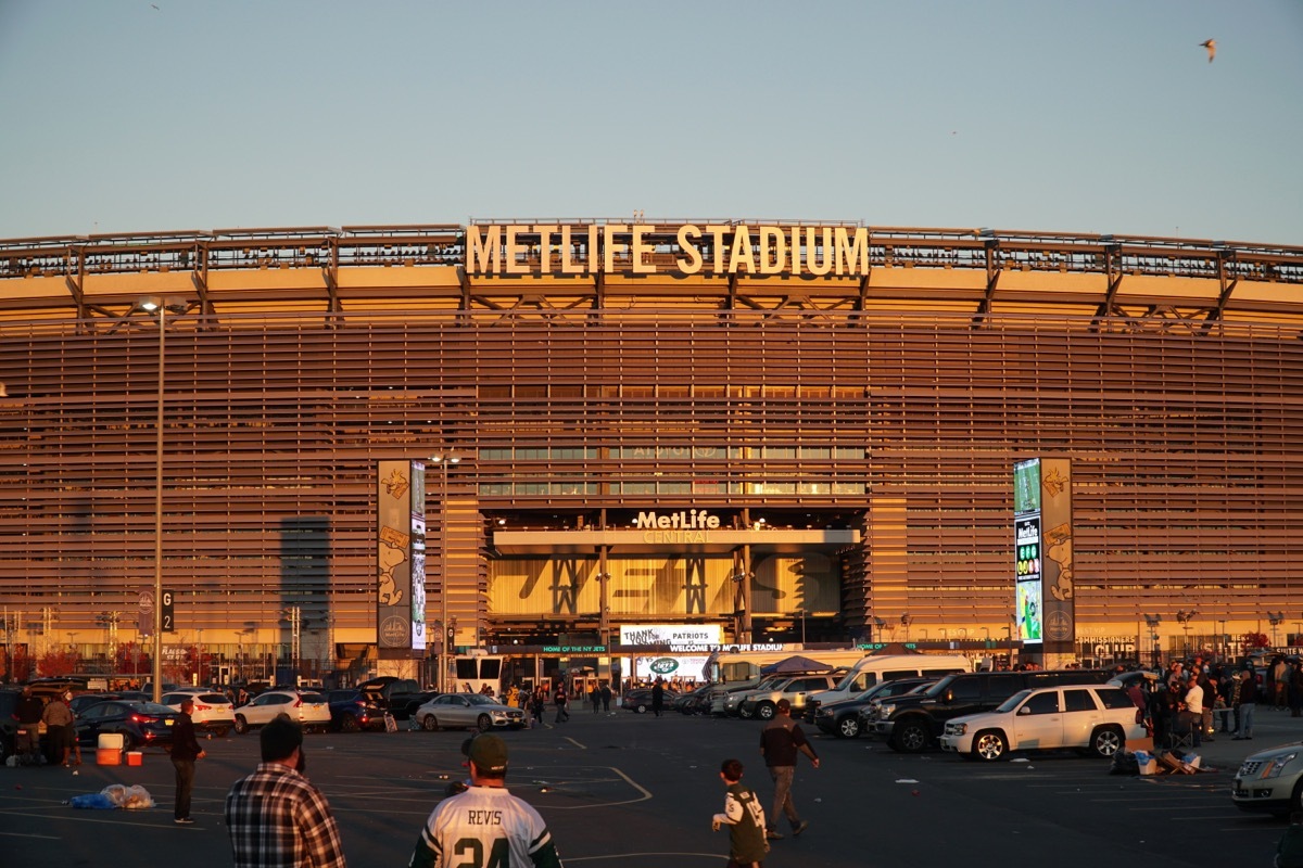 East Rutherford, New Jersey - November 2016: Metlife Stadium at sunset golden hour before New York Jets football game as fans tailgate before enter arena