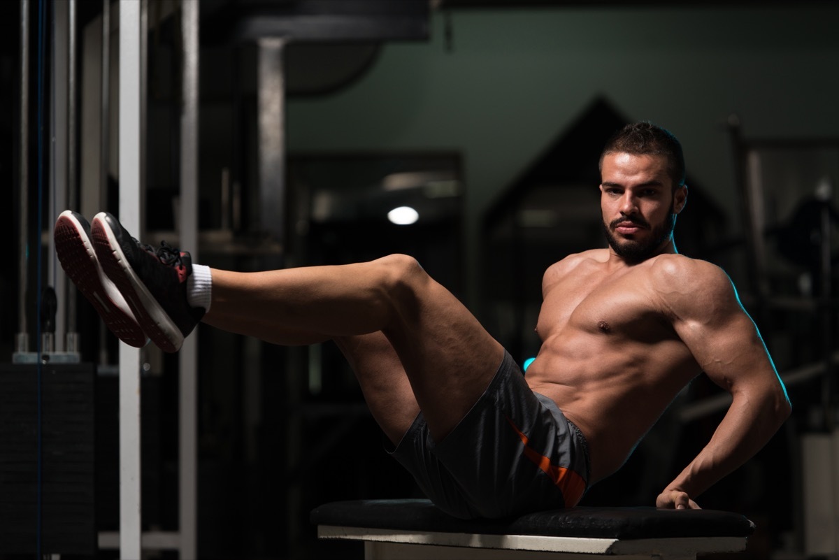 Exercising Abs On Bench Plank Hip Raise Abdominal Crunch In Fitness Club