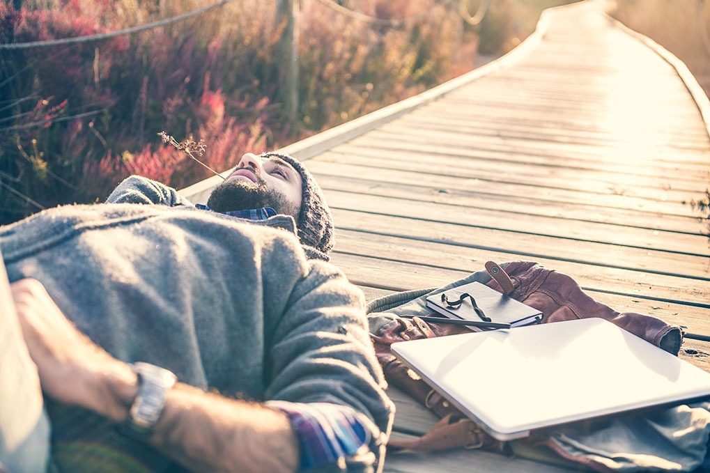 man relaxing outside exercises for mental health