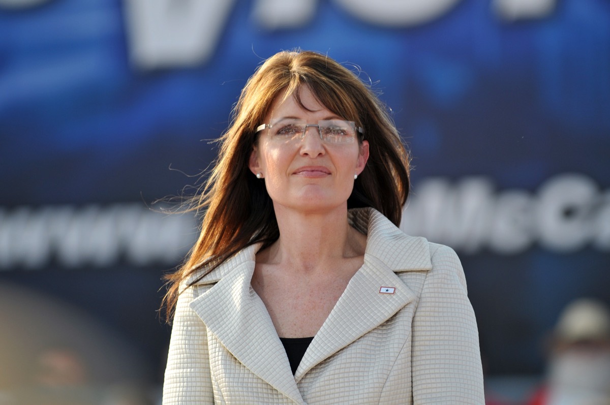 sarah palin wearing a light colored blazer and glasses