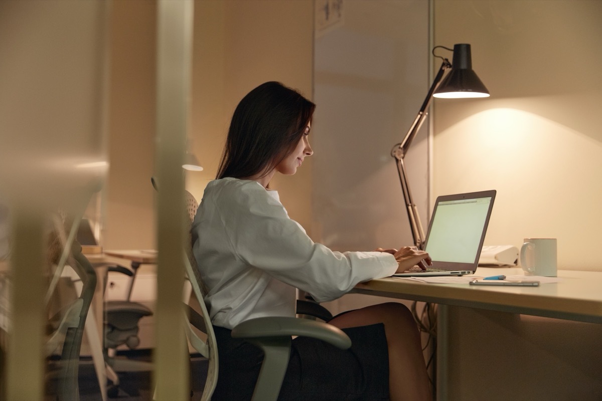 woman sitting in desk chair