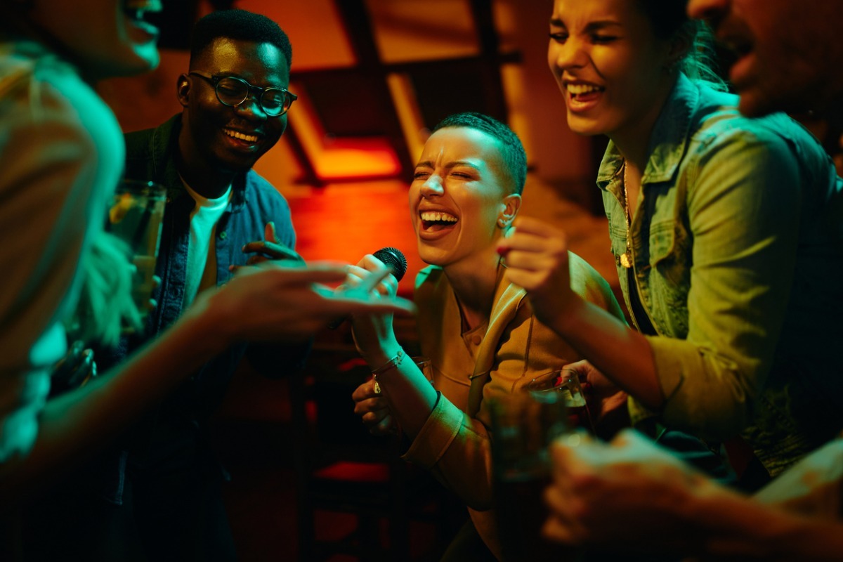 group of friends singing karaoke