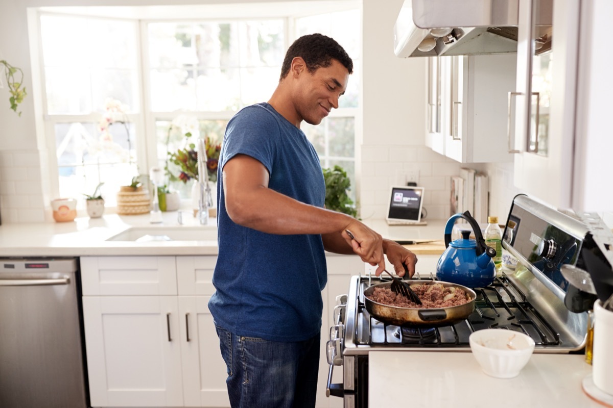 Man cooking in kitchen