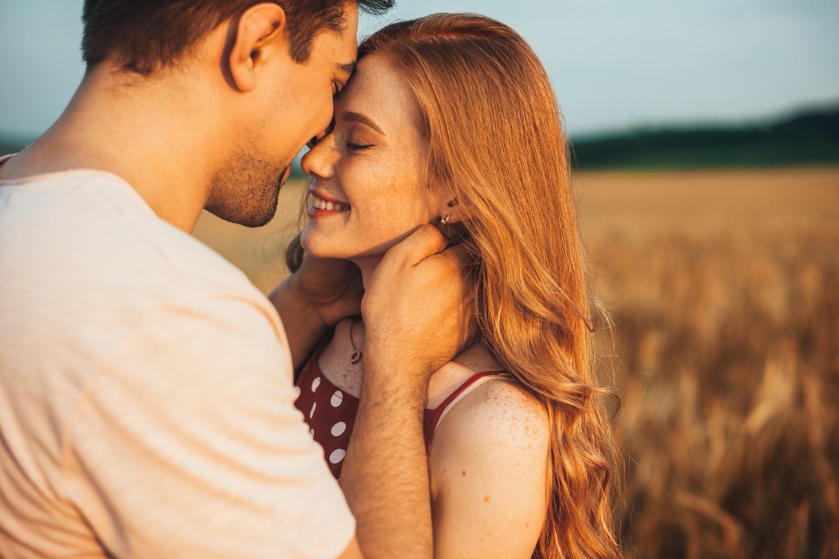 couple touching sharing romantic moment