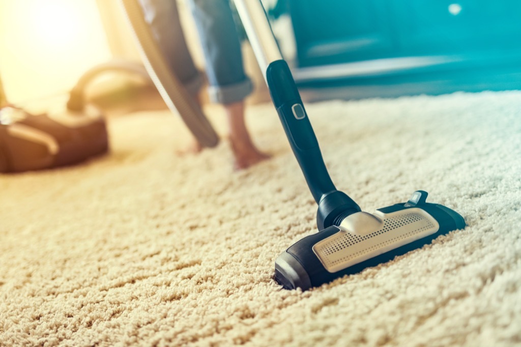 vacuuming carpet dorm room