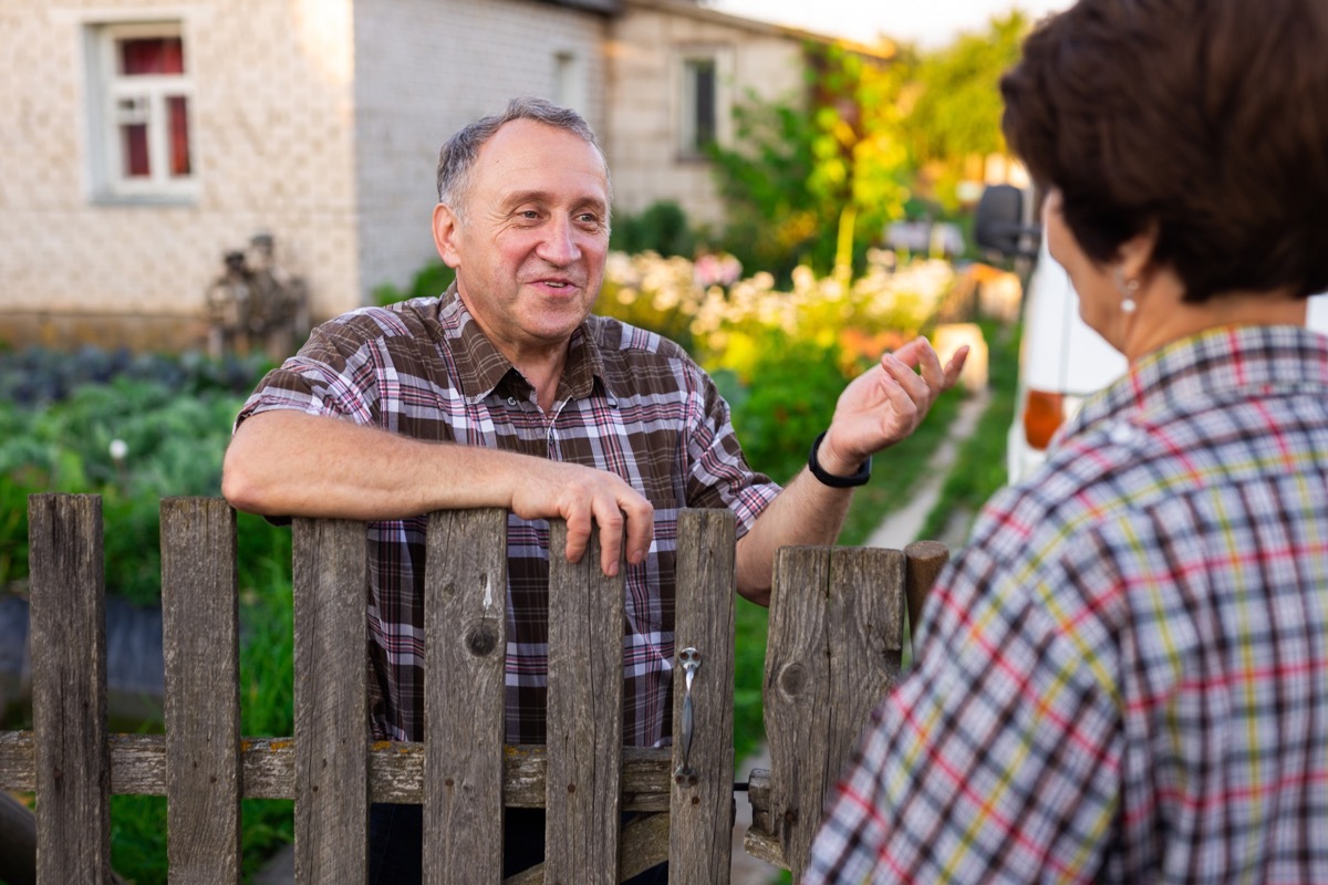 Neighbors Talking Over the Fence