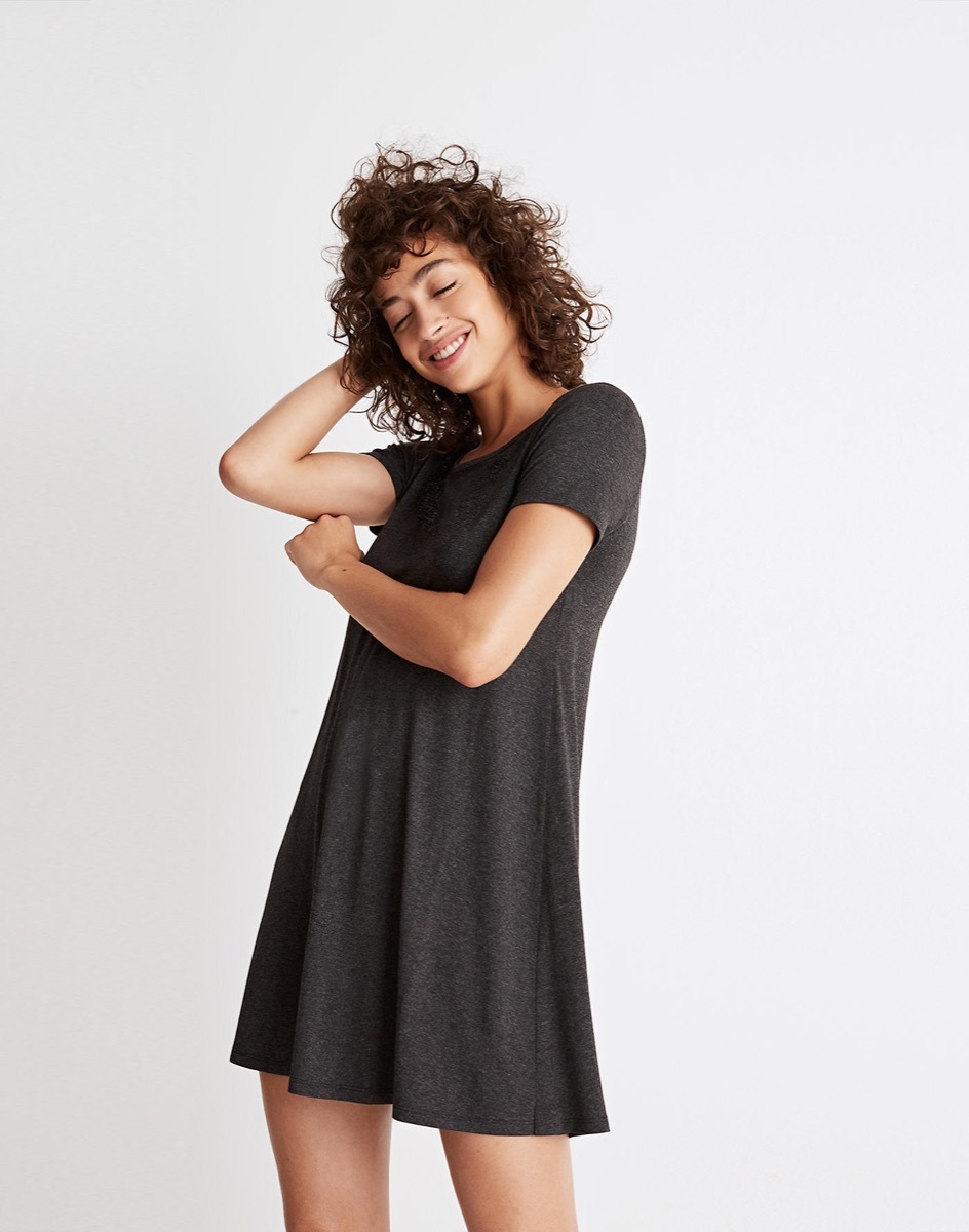 young woman wearing black t-shirt dress