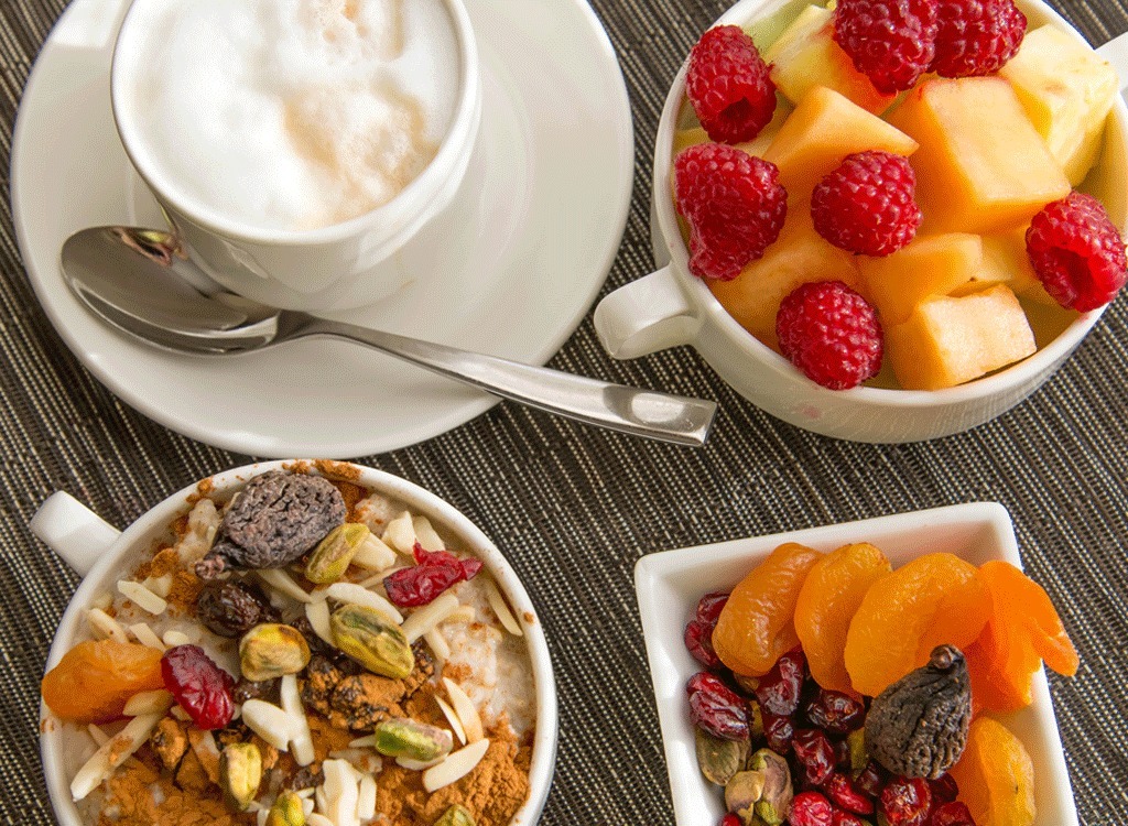 Oatmeal with cantaloupe and coffee during breakfast