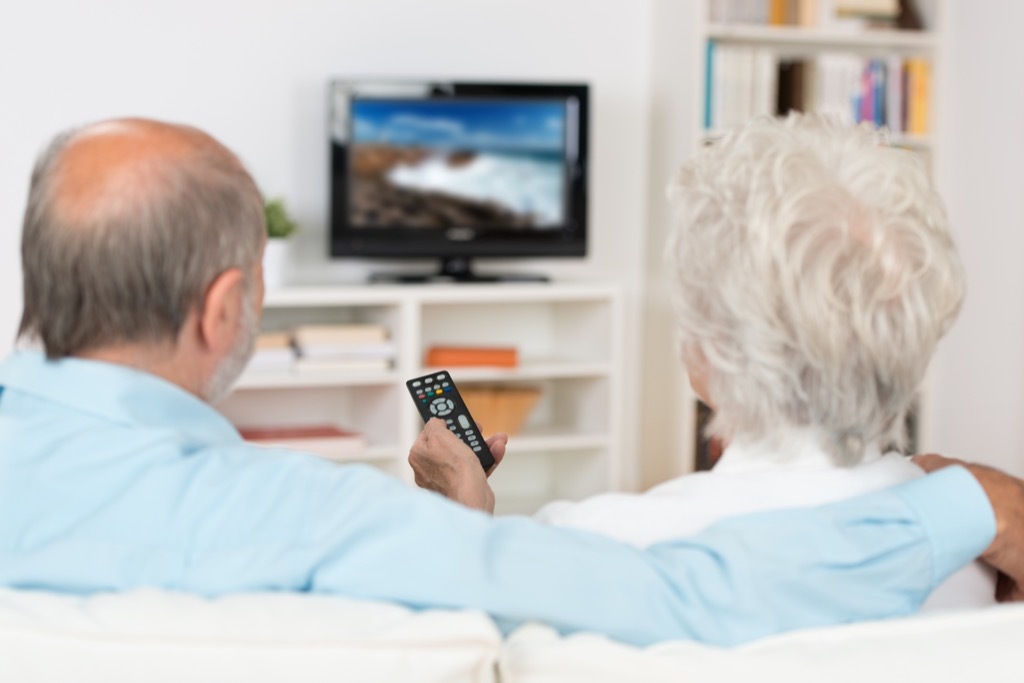 old couple watching tv