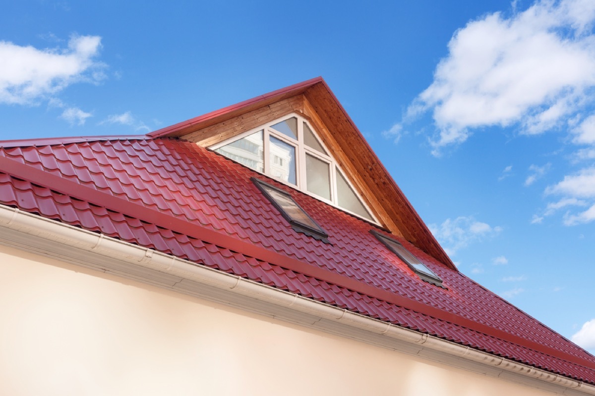 window under roof overhang