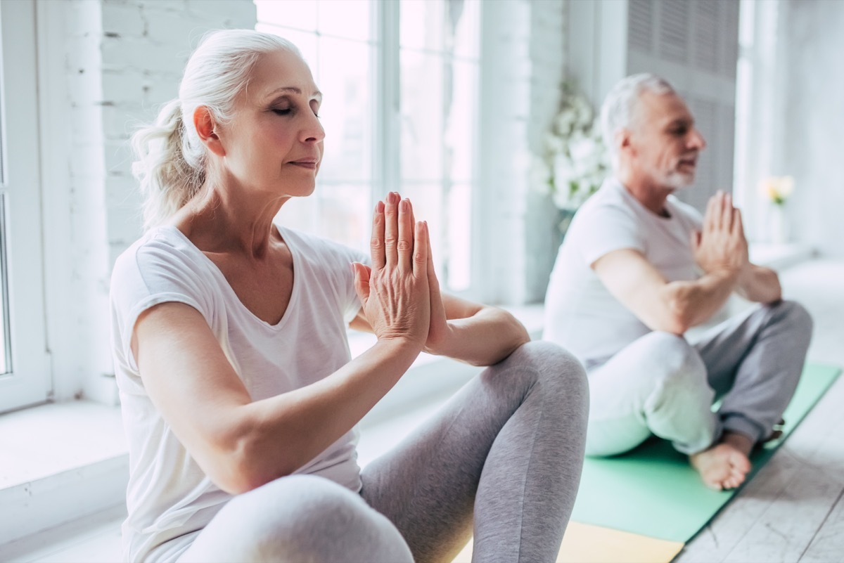 Older Couple Doing Meditation