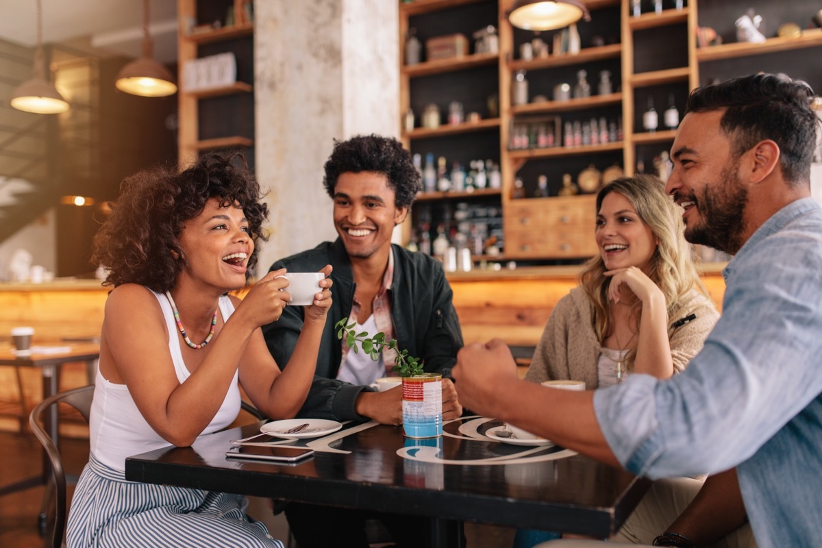 group of friends chatting at a cafe