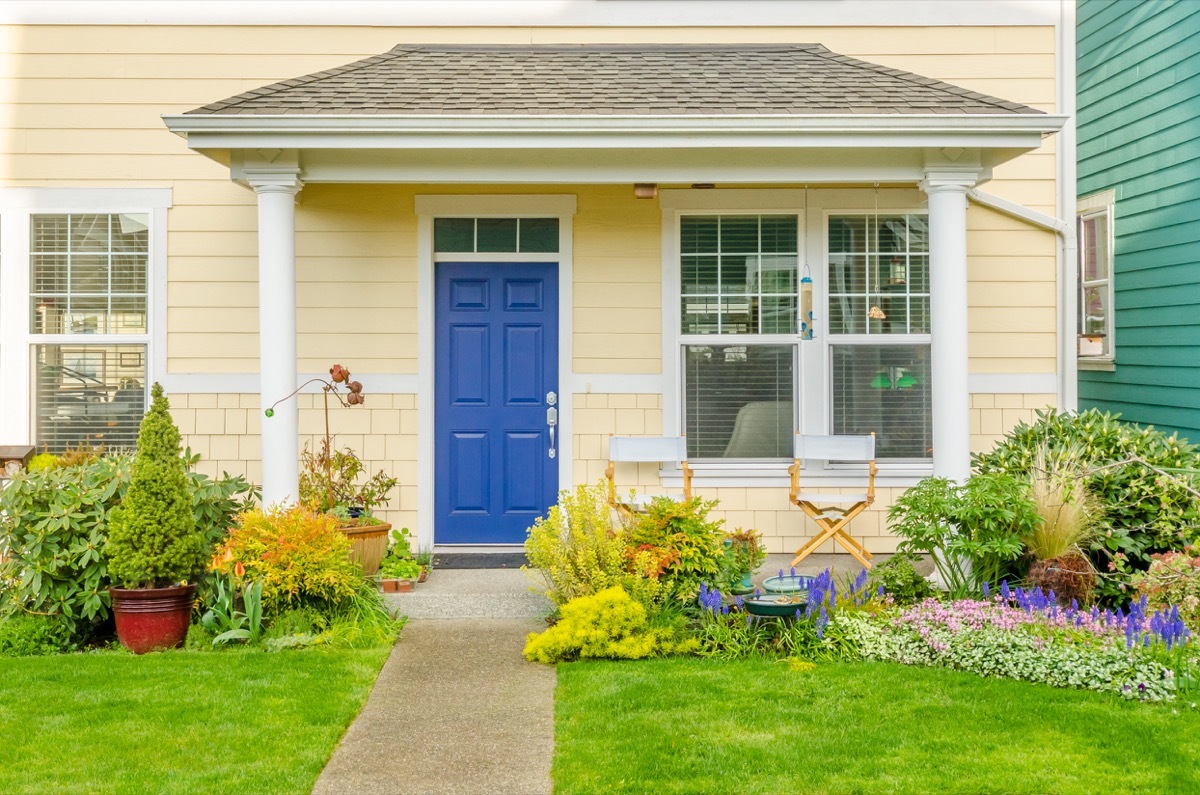 Yellow house with blue door