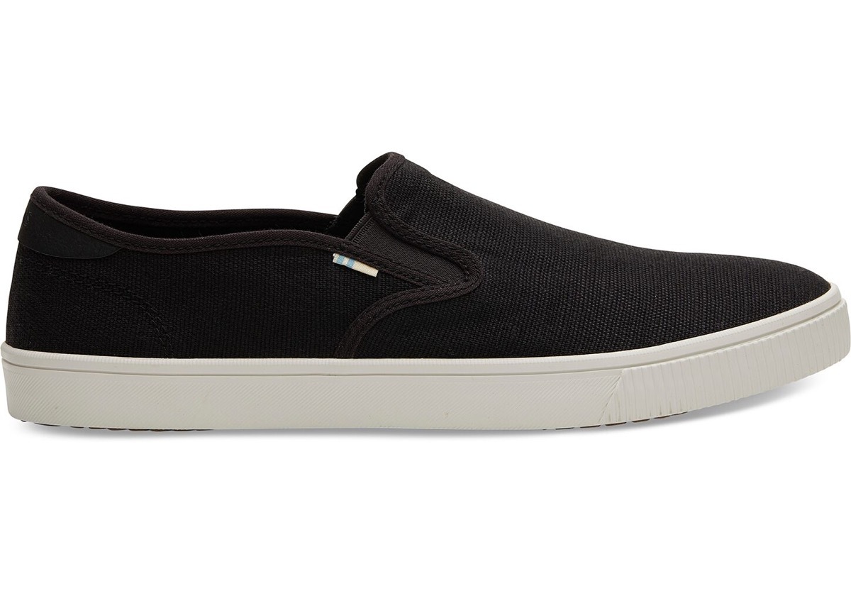 black toms sneakers with white soles