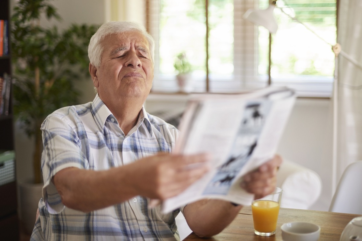 man struggling with blurry vision, bad eyesight