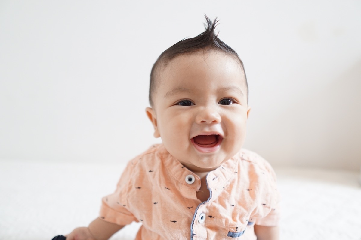 Close-up photo of a baby laughing