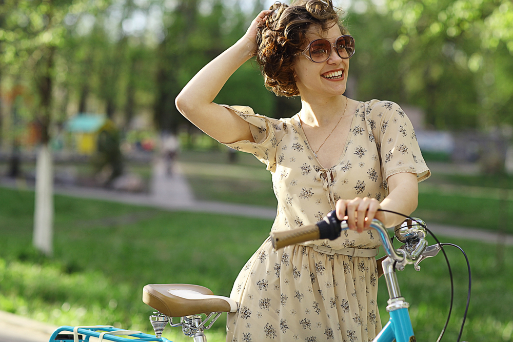 cheerful girl with bicycle