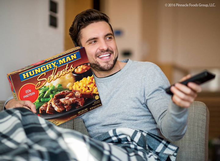 Man with Hungry-Man frozen dinner