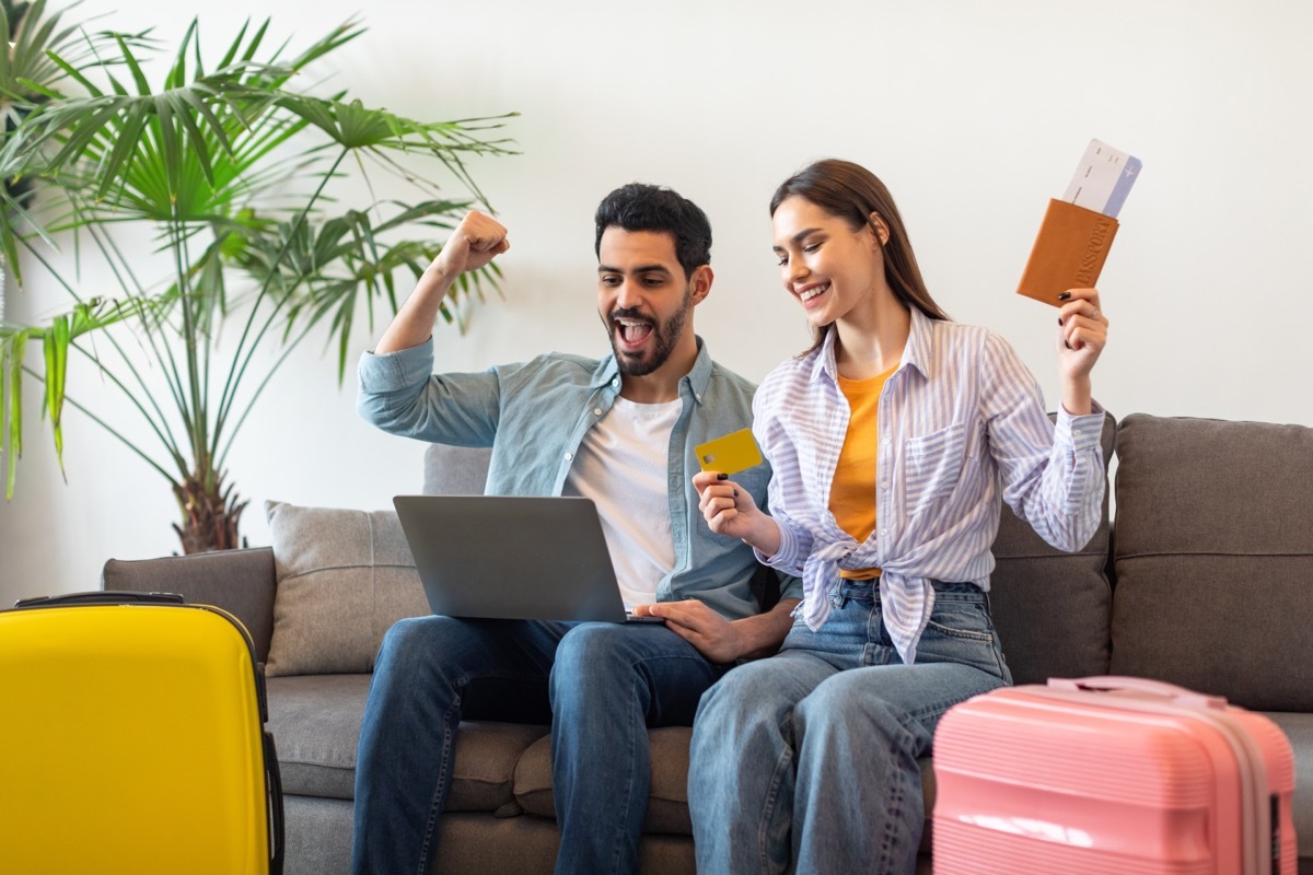 Two People with Luggage and Passports