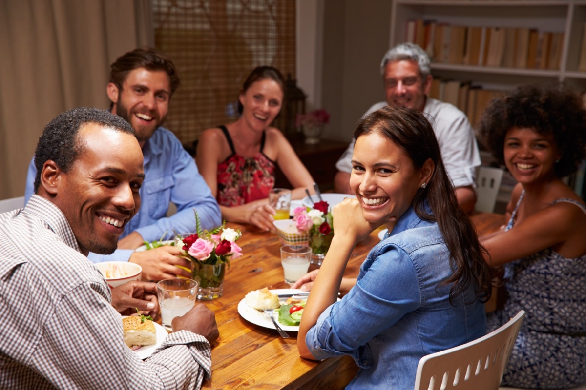 Friends at an evening dinner party.