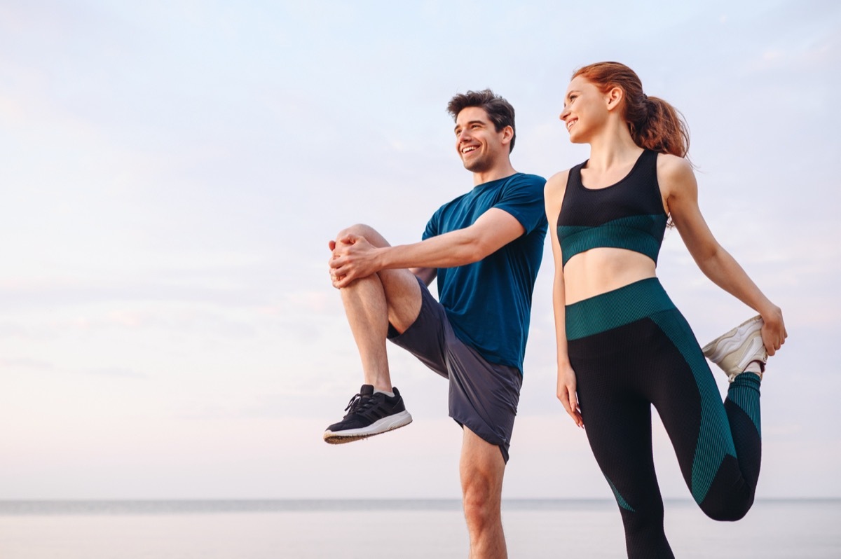 Two People Stretching