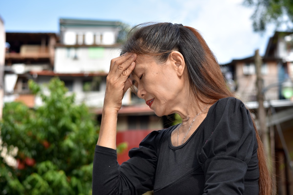 confused older woman lost outside, rude behavior