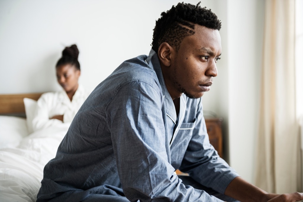 couple arguing in bedroom