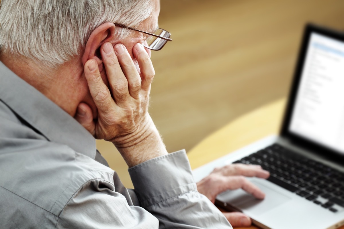 Older man on laptop