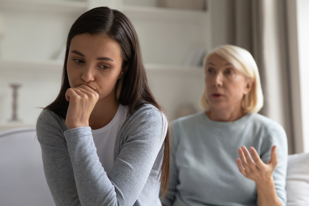 Young adult woman in argument with senior mother