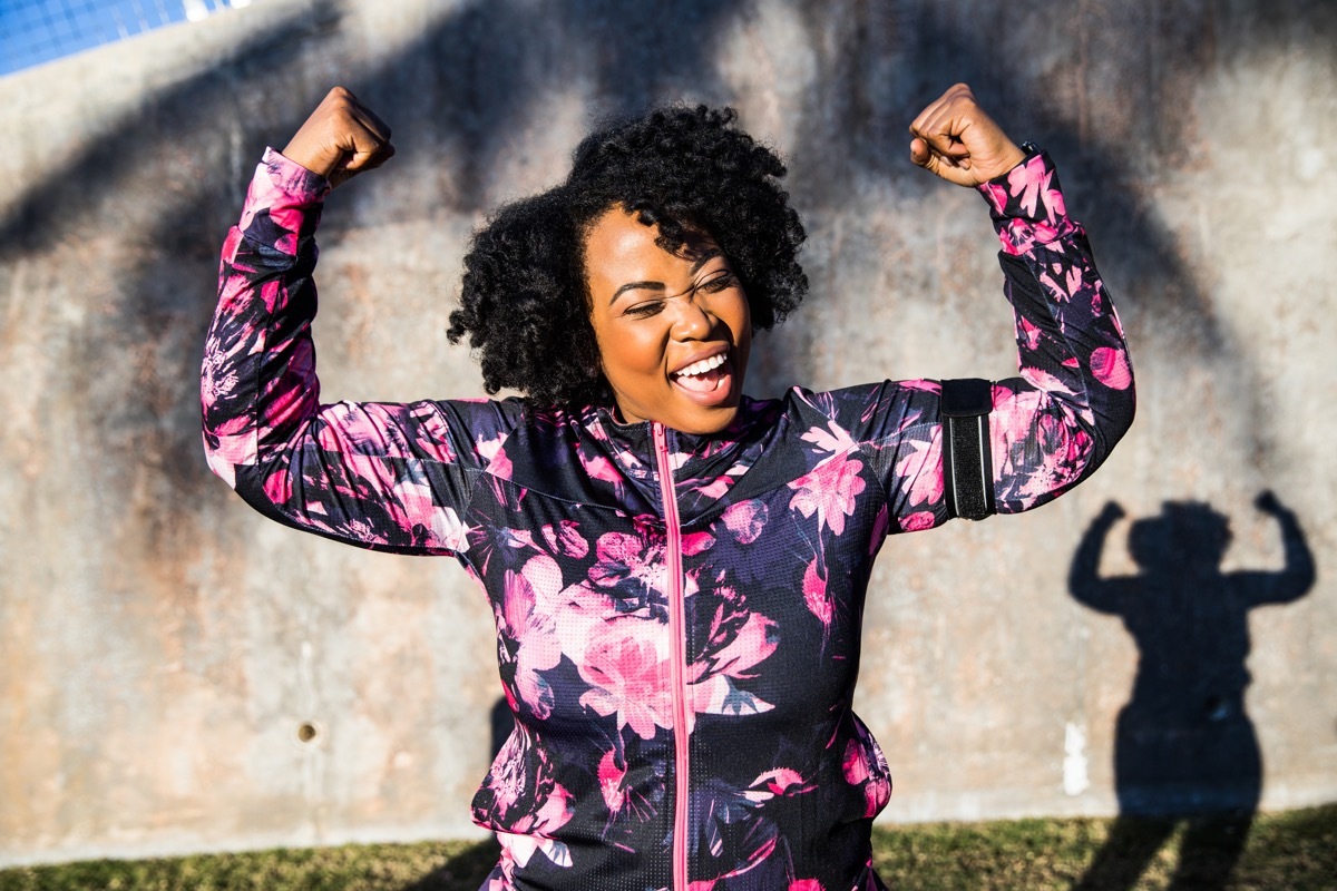 Funny portrait of a young black curvy woman during a training workout session