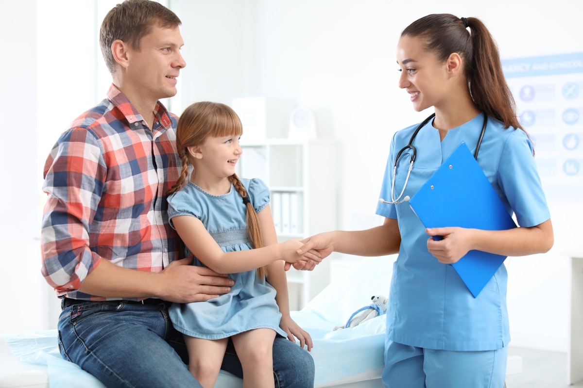 girl shaking nurse's hand old-fashioned manners