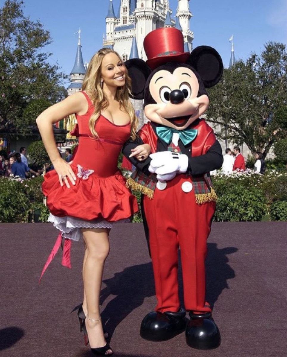 mariah carey with mickey mouse at disneyland, disney celebs