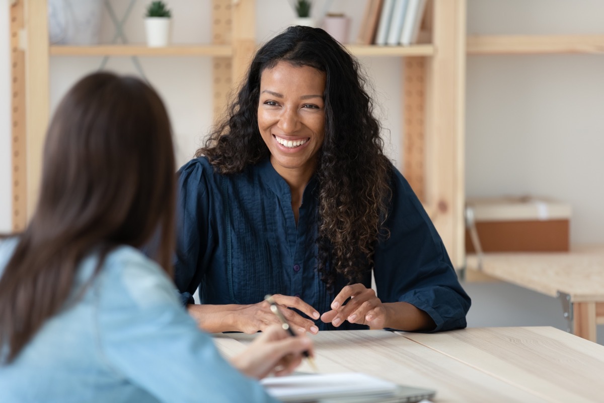 Two Women Talking Excitedly